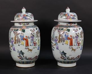 234	Pair of Chinese Porcelain Ginger Jars	Pair of Chinese porcelain ginger jars. Polychrome with scenes of every day life. Blue six character marks to the undersides. Each 16"H.
