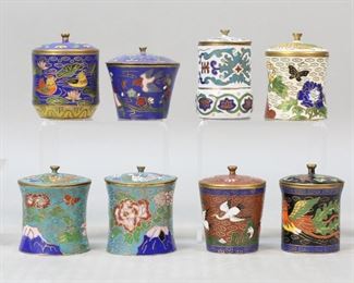 240	10 Chinese Cloisonne Trinket Boxes	10 Chinese cloisonne trinket boxes, including a pair with dragon motif lids, duck motif, flowers, cranes, birds. Pair each 1 7/8"H, box with rooster lid 2 1/8"H. Blue box with cranes scratched on one side.
