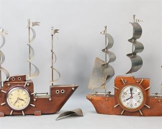 291	2 Clipper Ship Clocks Mastercrafters & United	2 clipper ship form electric clocks. Mastercrafters Yankee Clipper with Sessions movement, 18 1/2"L; United self starting, 17 1/2"L. United runs, timekeeping untested; Mastercrafters not running. One sail detached from United and support missing, scratches and minor chips to wood on both, United missing one handle on clock face, tarnishing and discoloration to sails on both, one foot chipped on United.
