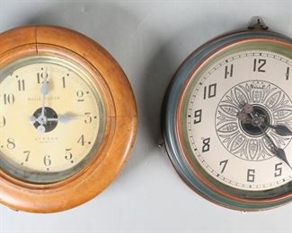 294	2 Bulle Circular Electric Wall Clocks	2 Bulle French battery powered electric wall clocks. Both with round cases. Bulle Electro Magnetic model EE wall clock with painted metal case, serial # 62414, 16"-diameter; Bulle Clock Bte S.G.D.G. gallery style wall clock with wooden case, serial # 90857, 15 1/2"-diameter. Metal clock wear and discoloration around edges of face, losses to paint decoration on case; wooden clock losses and warping to face, scratches to case and separation at seams.
