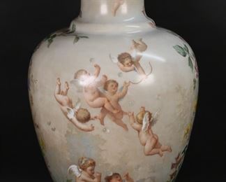 313	Vienna Style Porcelain Vase	Vienna style porcelain floor vase. Hand painted with flowers and cupids. Unsigned, inscribed in red on the underside 15 Janvier. 25 5/8"H.
