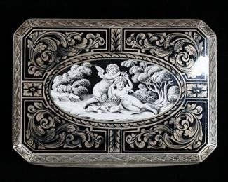 373	800 Silver Compact / Card Case	800 silver compact or card case. Lid with cherubs and fruit, gold washed interior. Stamped 800 behind the mirror on interior of lid. 3"L x 2 1/8"W x 3/8"H; 100.2 grams total including mirror. Mirror detached, desilvering to mirror, adhesive residue to interior of lid, scratches to interior, minor losses to gold wash on interior.
