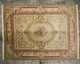 383	Floral Room Size Rug	Room size rug. Floral center medallion and red border. 11'5 x 8'7". Fading and discoloration.

