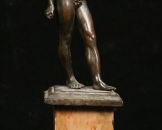 397	After Giovanni Da Bologna Bronze Male Nude	After Giovanni Da Bologna, called Giambologna (Italy, 1529-1608). Bronze, male nude. On a marble pedestal. 8 3/8"H. Chips to base and pedestal.
