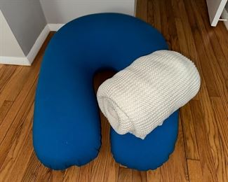 Yogibo back rest support pillow with an ivory cotton-blend blanket from IKEA 
