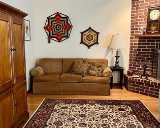 Henredon sofa, vintage God's Eye wall hangings, vintage brass Stiffel lamp