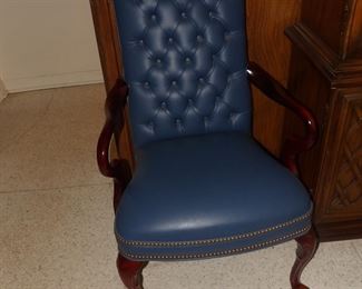 Leather and wood armchair