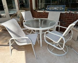 Patio table
2 swivel chairs
2 regular chairs