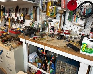 Bench full of hand tools