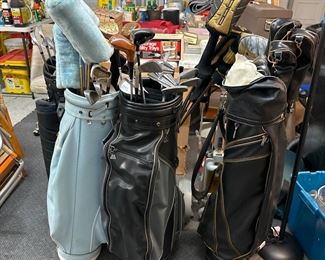 Golf clubs , bags and balls