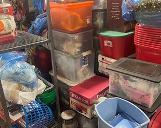 Large christmas items and bins of christmas items.