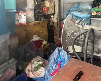 Dresser and bins of Christmas items.