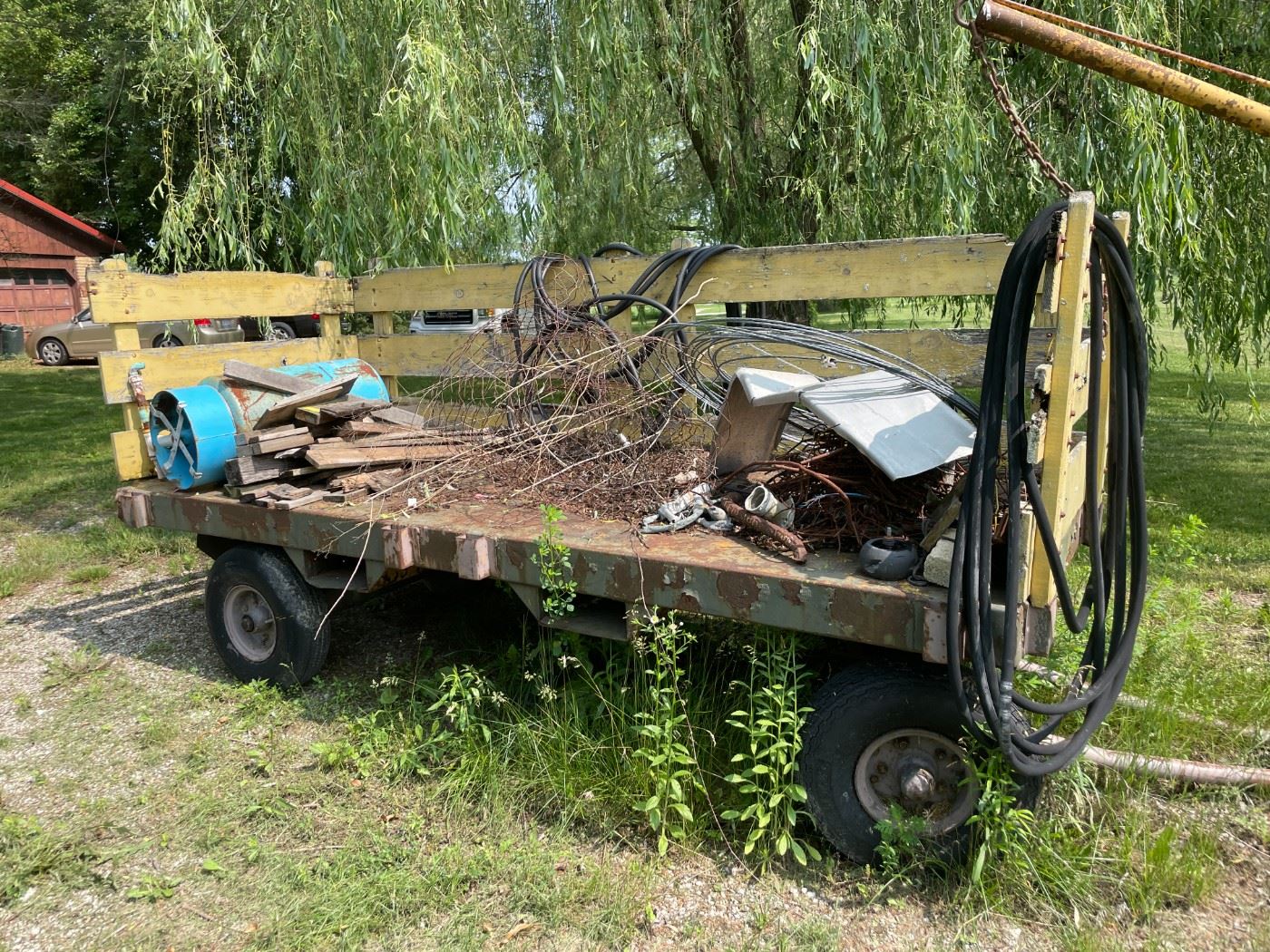 . . . the other side to this large hay wagon is on the premises