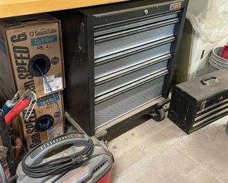 . . . Whirlpool Gladiator moveable storage cabinet -- vacuum, General Cable