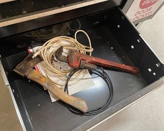 . . . hatchet, pipe wrench