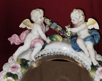 Beautiful vintage Dresden porcelain Sitzendorf wall mirror with cherubs and encrusted flowers with two candle holders 
