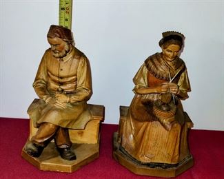 Hand carved black forest figurines. 1950s Amazing condition. Old woman sewing and old man holding pipe. 