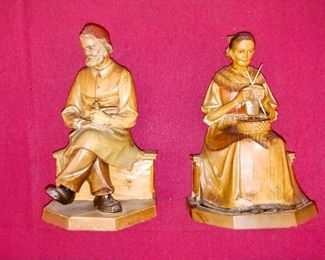 Hand carved black forest figurines. 1950s Amazing condition. Old woman sewing and old man holding pipe. 