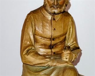 Hand carved black forest figurines. 1950s Amazing condition. Old woman sewing and old man holding pipe. 