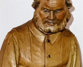 Hand carved black forest figurines. 1950s Amazing condition. Old woman sewing and old man holding pipe. 