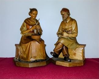 Hand carved black forest figurines. 1950s Amazing condition. Old woman sewing and old man holding pipe. 