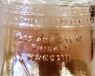 Pass and stow Philadelphia Liberty Bell coin bank in Amber