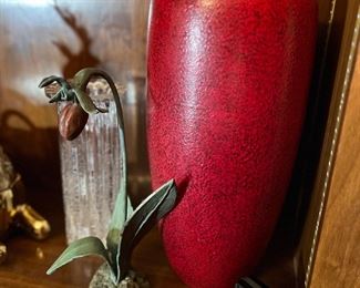 Orchid is a signed bronzed sculpture. 