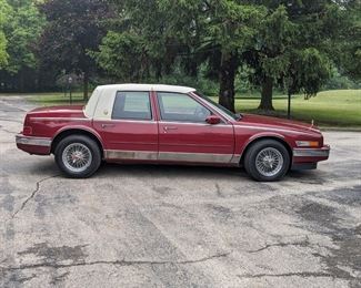 1988 Cadillac Seville Miles: 73200 Garnet red, white top, with gold package, vintage REAL spoke wheels from Don Massey Cadillac. Stored indoors. Car is started 2-3 times a week. May need a new battery. AC unit needs servicing as it does not get very cold, but does work. PRICE: $9400 (open to offers)