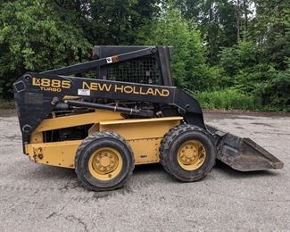 1999 New Holland LX 885 Skid Steer 1647 HRS, with (2) new tires Included: snow wolf ultra hydraulic plow, construction attachments 45" forks, & heavy duty bucket Stored indoors. Was mainly used for snow removal on property. PRICE: $21,000