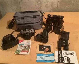 Canon Camera And Bushnell Binoculars