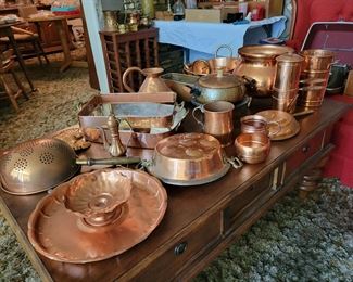 Copper cookware and serving pieces
