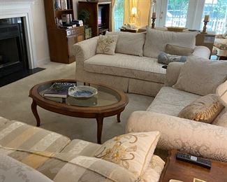 Lovely living room with three uupholstered sofas by Ethan Allen and tabkes by Ethan Allen