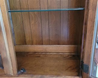 Interior of Ethan Allen lighted China Cabinet with glass shelves