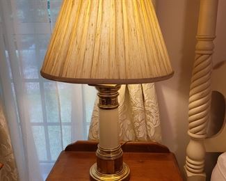 Pair of cream and brass lamps