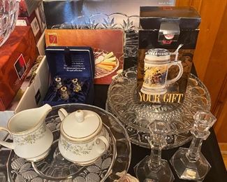 Lots of platters, cake stands, serving pieces, many in original boxes