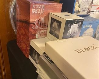 Lots of platters, cake stands, serving pieces, many in original boxes