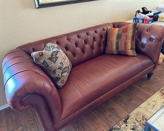 Chesterfield leather sofa! 1 year old!  We are pre selling this item!