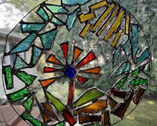 Many beautiful stain glass pieces
