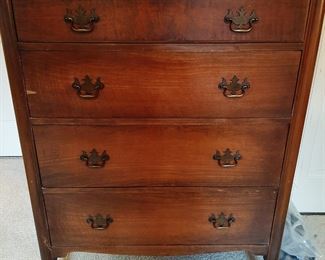 This dresser is made right in Owosso! The company is Estey. Quality made. One small piece of veneer missing.