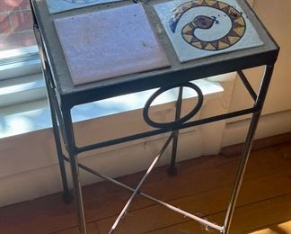 Southwestern motif tile and metal plant stand