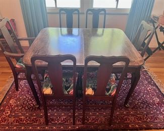 Antique dining table (without leaf) and 6 chairs with wool area rug