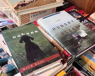 Boxes of books including fiction, cooking and childrens