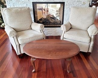 Toms-Price studded recliners (wheat) $450 each. Oval coffee table $75