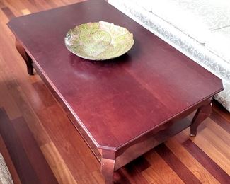Wood coffee table with lower shelf $80
