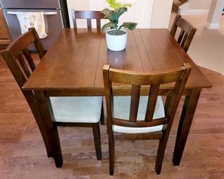 Square kitchen table with four chairs. All wood. $250