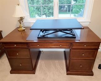 Wood Executive desk that comes apart very easily for moving. $150 (standing desk not available)