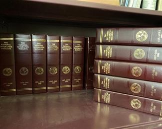 Partial pic of big  set of leather bound National Geo's great for you den bookcases!