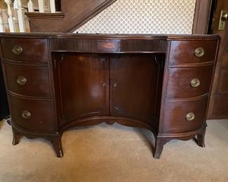 Bow front desk. Small nice as entry way piece. Cubby for bar? 