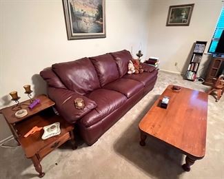 Amazing burgundy leather couch… Originally $300… Saturday morning 150 bucks!