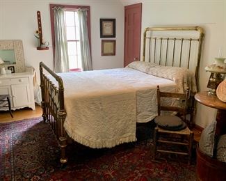 Victorian era brass 3/4 bed with nearly new mattress, many matelasse coverlets, crochet throws, linens and pillows 